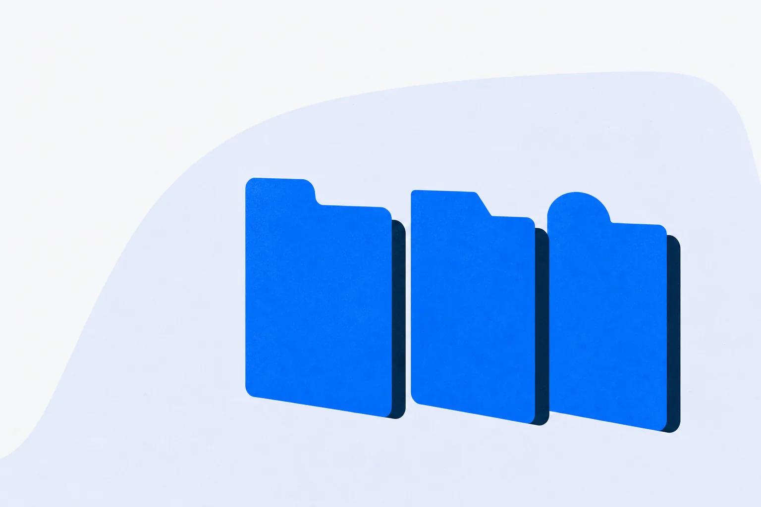 Three upright folders whose tabs are cut to different shapes, standing for three different jobs sold as one category
