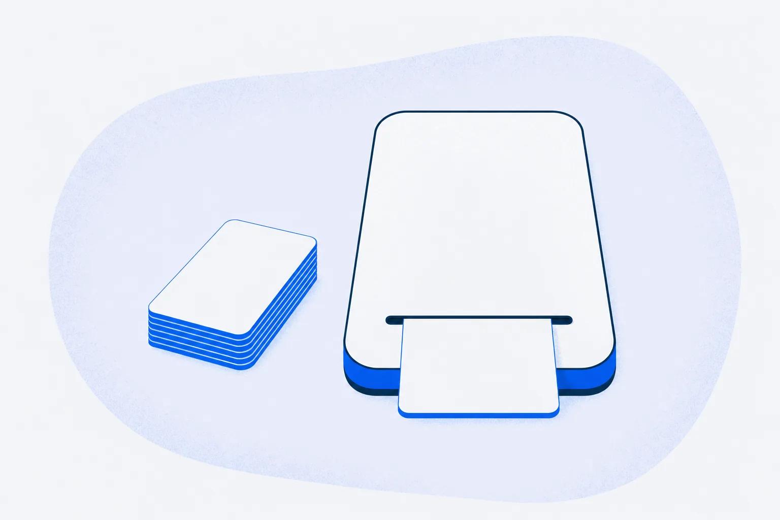 A flat phone with small cards stacked beside it and one half-inserted, for short training served on a shop-floor phone