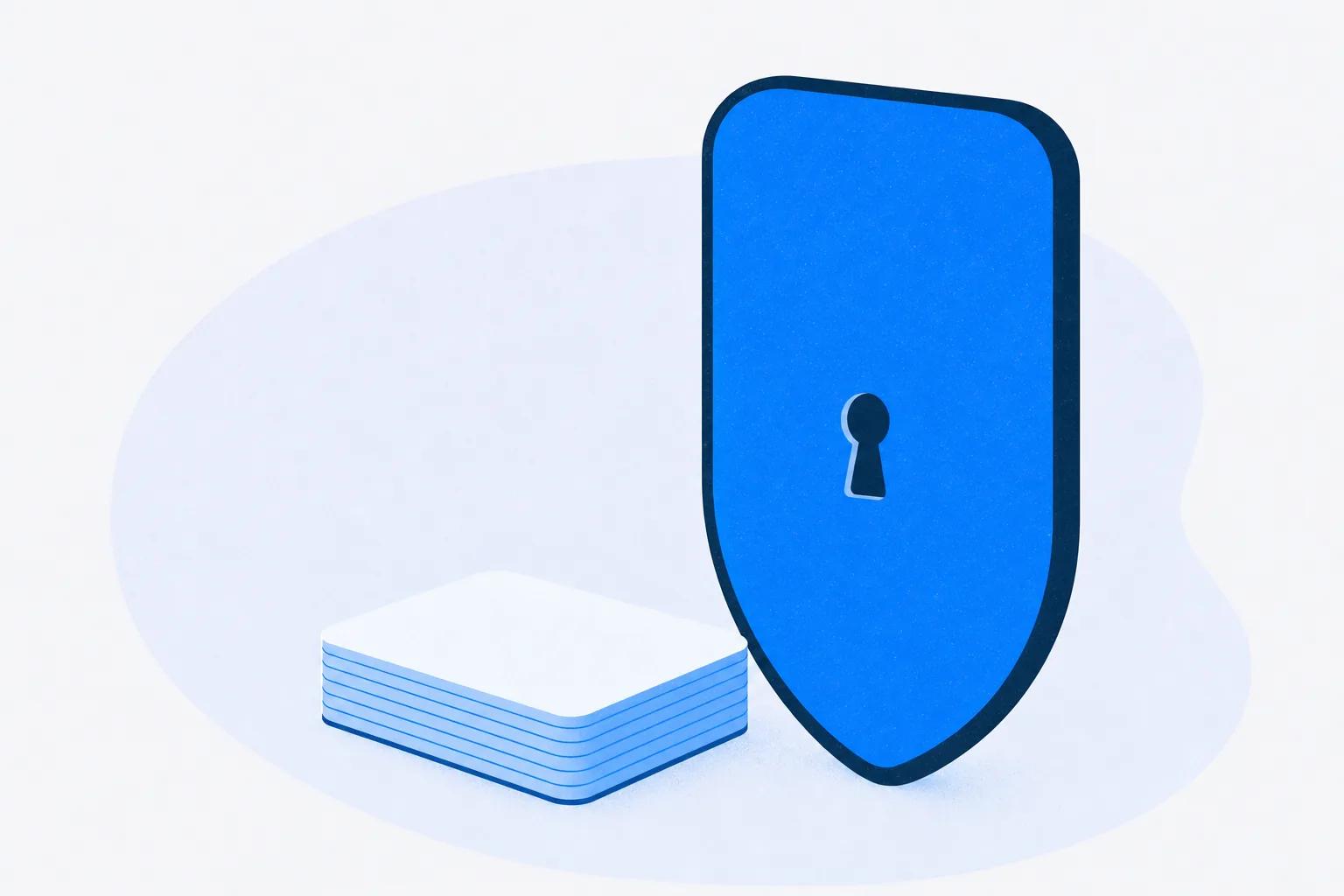 A shield plate with one keyhole beside a stack of blank cards, standing for the evidence a security review asks for